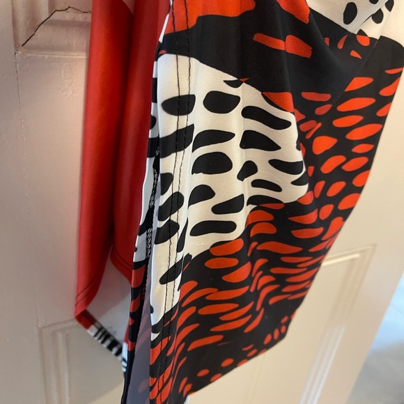 Soft polyester jumpsuit with side pockets, relaxed fit. New - Picture 5 of 6